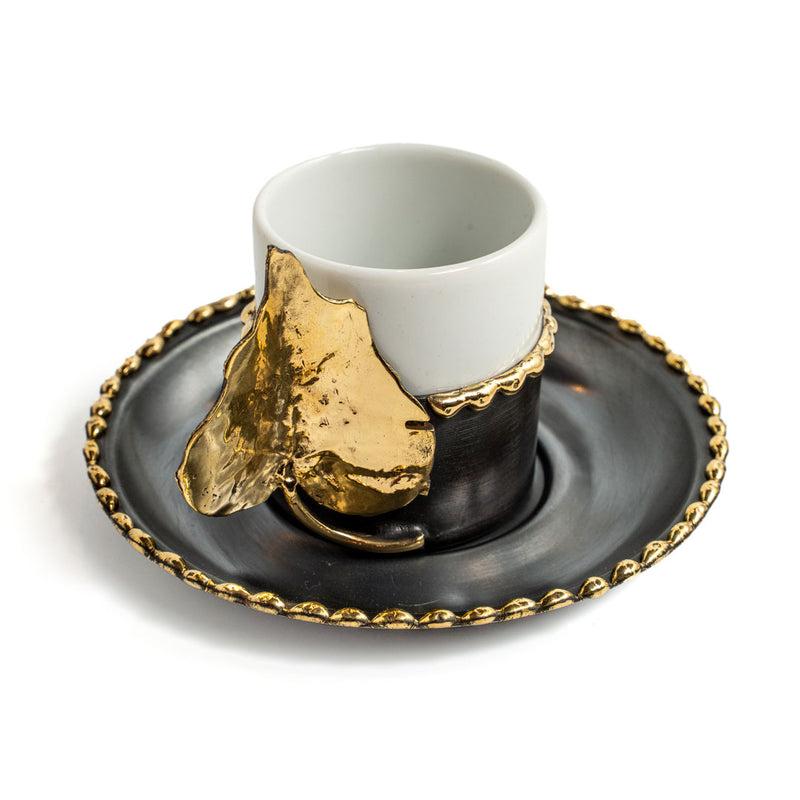 Copper coffee cup with leaf motifs
