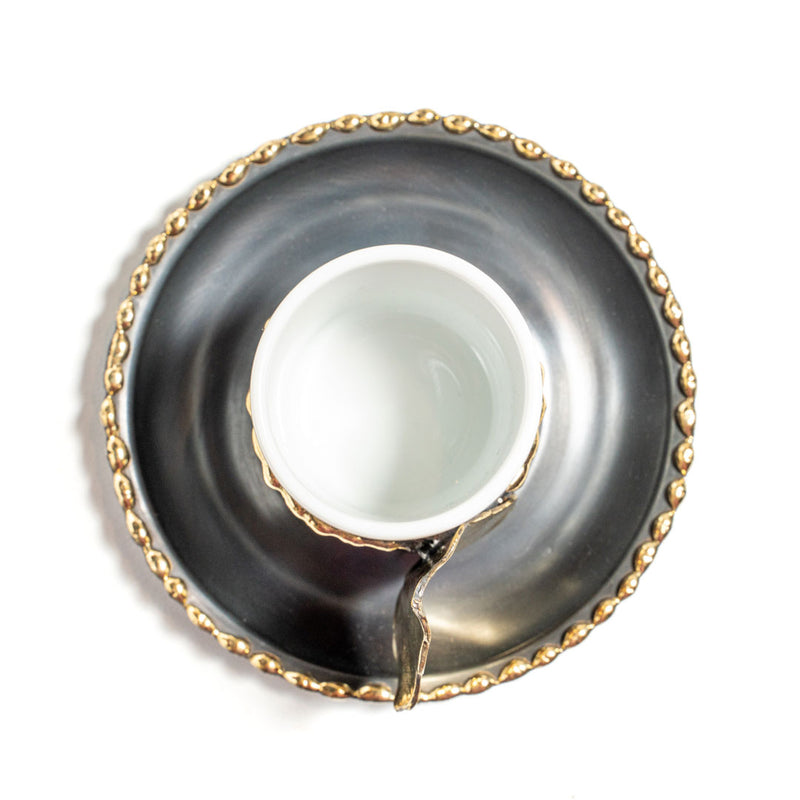 Copper coffee cup with leaf motifs