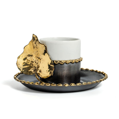 Copper coffee cup with leaf motifs