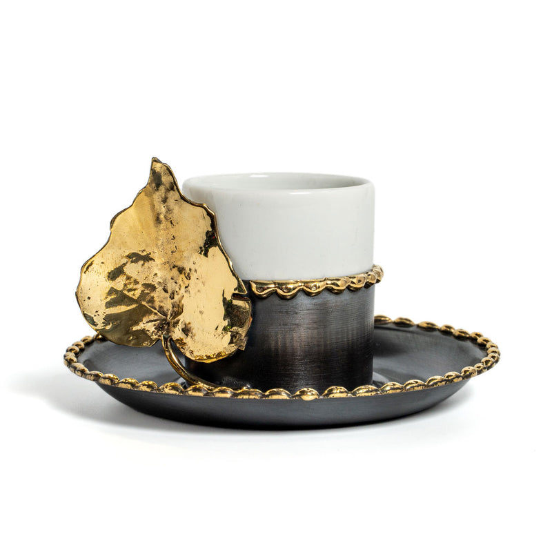 Copper coffee cup with leaf motifs